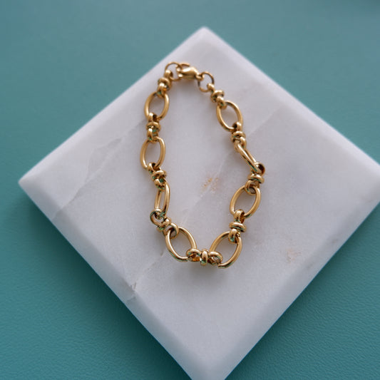 Gold cross bracelet